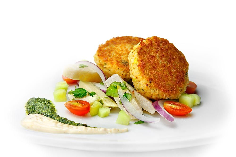 coastside crab cakes with jicama-cucumber salad, Bay Spice aioli and chimichurri sauce